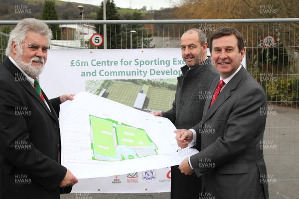 23.01.12 - Launch of six million pound Centre for Sporting Excellence, Ystrad Mynach -  Chief Executive of the Welsh Rugby Union Roger Lewis(rt) and Cllr Allan Pritchard(lt) leader of Caerphilly Council with Joe Lydon(centre) Head of Rugby Performance and Development with the WRU at the site of the proposed new development. 