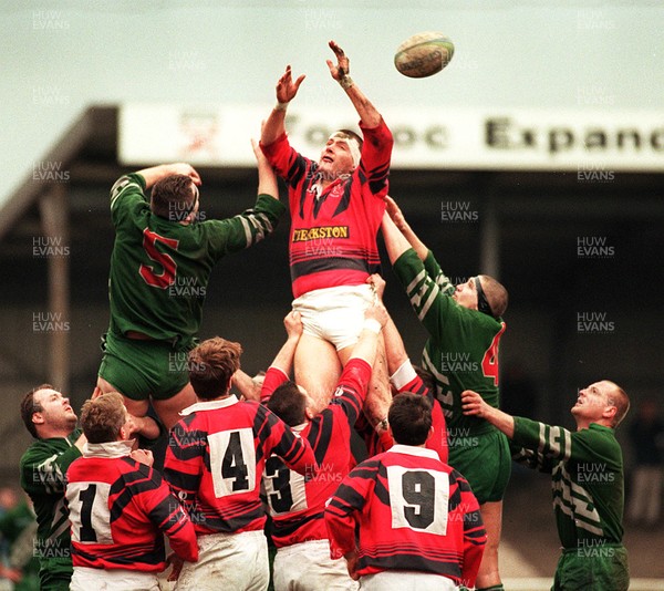 161295 - Aberavon v Caerphilly - Paul Matthews of Aberavon fails to take clean ball as Ian Phillips and Jarrod Lougher spoil