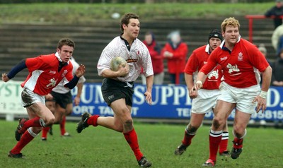 030104 - Aberavon v Llanelli Aberavon's Sam Greenaway exploits a gap in Llanelli's defence  