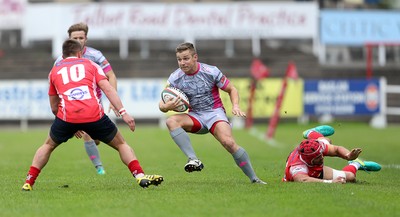 081016 - Aberavon v Llanelli - Principality Premiership - Stef Andrews of Aberavon makes a break past the Llanelli defence