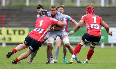 081016 - Aberavon v Llanelli - Principality Premiership - Ben Jones of Aberavon is tackled by Rhys Fawcett of Llanelli