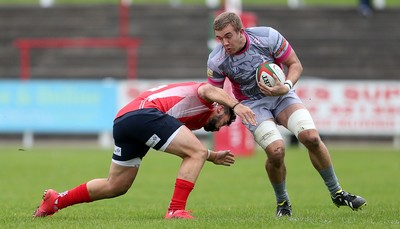 081016 - Aberavon v Llanelli - Principality Premiership - Ben Jones of Aberavon is tackled by Gareth Owen of Llanelli