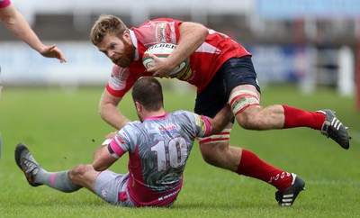 081016 - Aberavon v Llanelli - Principality Premiership - Tom Phillips of Llanelli is tackled by James Garland of Aberavon