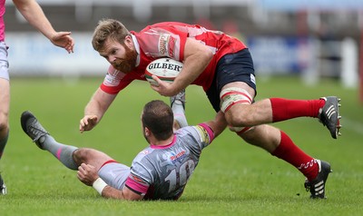 081016 - Aberavon v Llanelli - Principality Premiership - Tom Phillips of Llanelli is tackled by James Garland of Aberavon