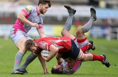 081016 - Aberavon v Llanelli - Principality Premiership - Tom Phillips of Llanelli is tackled by James Garland of Aberavon