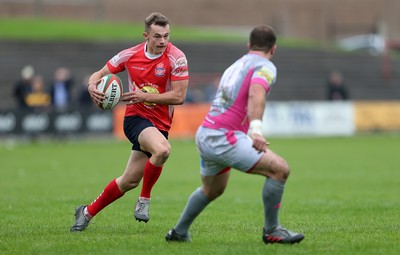 081016 - Aberavon v Llanelli - Principality Premiership - Ioan Nicholas of Llanelli is challenged by James Garland of Aberavon