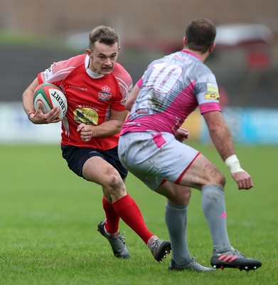 081016 - Aberavon v Llanelli - Principality Premiership - Ioan Nicholas of Llanelli is challenged by James Garland of Aberavon