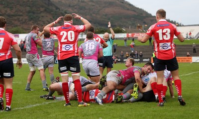 081016 - Aberavon v Llanelli - Principality Premiership - Chris Davies of Aberavon pushes over to score a try