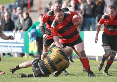 250212 Aberavon RFC v Newport RFC - Principality Premiership -Aberavon's Richard Morris is tackled by Newport's Dafydd Morgan