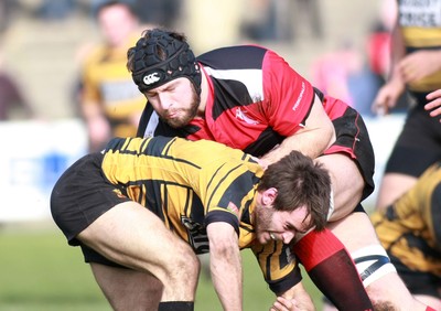 250212 Aberavon RFC v Newport RFC - Principality Premiership -Aberavon's Rhydian Gierat takes on Newport's Elliot Frewen