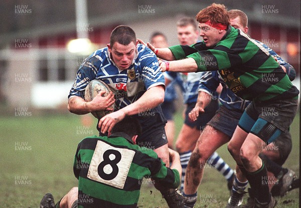 211296 - Abercarn v Ystradgynlais - Darren Fielding of Ystradgynlais is tackled by Roger Smith (8) and Dai Sage