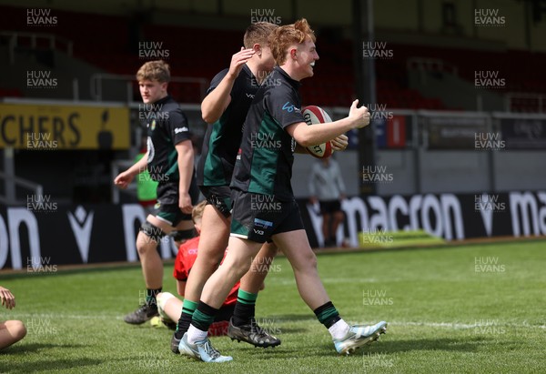 050525 - Abercynon v Llantrisant - U18 Shield Final - Boys U18s Finals Day - Regan Young of Llantrisant celebrates scoring a try