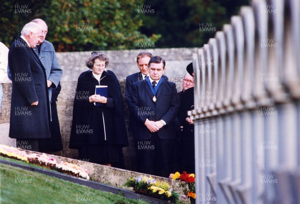 211091 - Picture shows Aberfan disaster anniversary Mourners at the gravesides during the memorial service