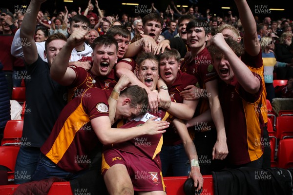 280419 - WRU Finals Day - Abergavenny RFC v Oakdale RFC - Nathan Williams of Abergavenny celebrates with friends in the crowd