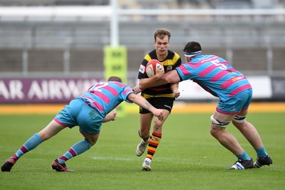 110525 - Aberteifi RFC v Newport Saracens - Mens Division 3 Cup Final - Jac Davies of Aberteifi is challenged by Brian Feeney of Newport Saracens