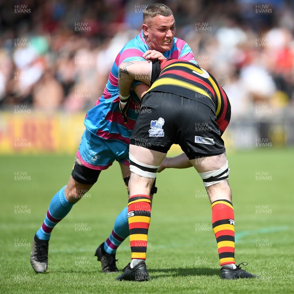 110525 - Aberteifi RFC v Newport Saracens - Mens Division 3 Cup Final - Joe Corten of Newport Saracens is challenged by Dan Jones of Aberteifi
