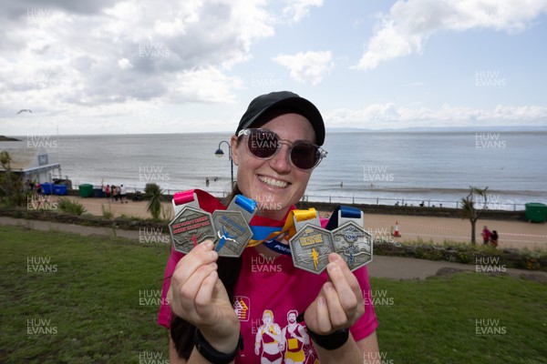 060823 - ABP Barry Island 10k - Sarah Witcombe-Hayes with her 4 medals in the ABP 10k Series