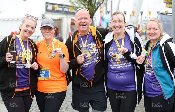 160423 - ABP Newport Wales Marathon & 10K - 10k finishers proudly display their medals and t shirts