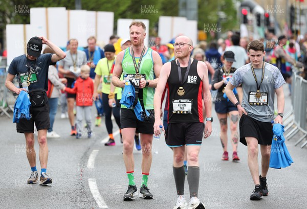 160423 - ABP Newport Wales Marathon & 10K - Runners cross the line at the end of the marathon