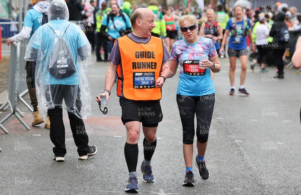 160423 - ABP Newport Wales Marathon & 10K - Blind runner Tracey with guide Dafydd Trystan at the end of the marathon