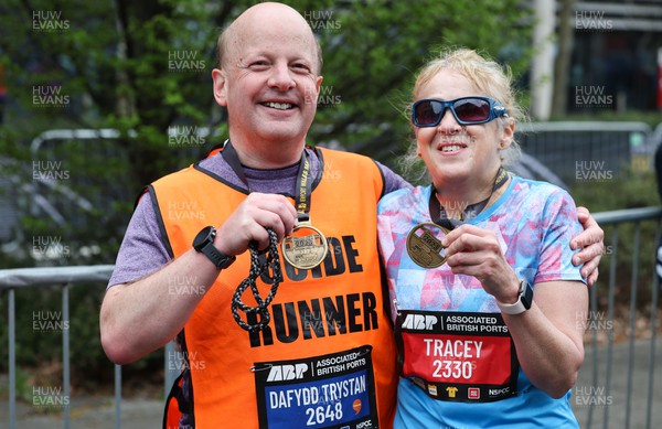 160423 - ABP Newport Wales Marathon & 10K - Blind runner Tracey with guide Dafydd Trystan at the end of the marathon