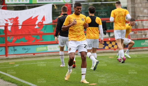 050823 - Accrington Stanley v Newport County - Sky Bet League 2 - Kyle Jameson of Newport County warms up in front of Welsh flag