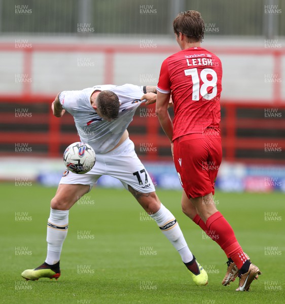 050823 - Accrington Stanley v Newport County - Sky Bet League 2 - Scot Bennett of Newport County is caught by Tommy Leigh of Accrington Stanley