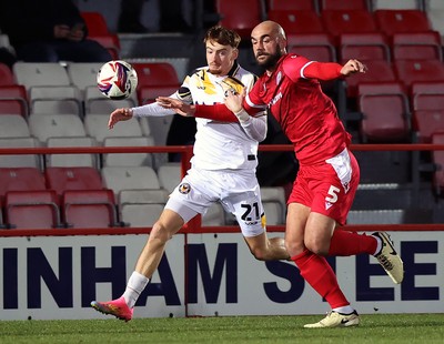 110325 - Accrington Stanley v Newport County - Sky Bet League 2 - Michael Spellman of Newport and Farrend Rawson of Accrington