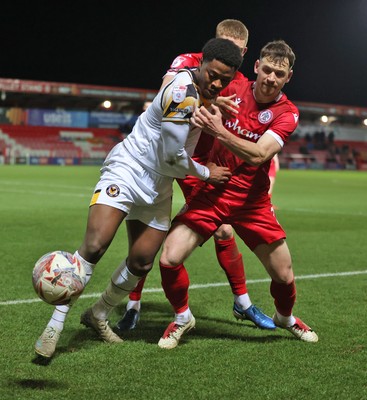 110325 - Accrington Stanley v Newport County - Sky Bet League 2 - Bobby Kamwa of Newport is held off the ball by Donald Love of Accrington