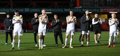 110325 - Accrington Stanley v Newport County - Sky Bet League 2 - Team applaud travelling fans at the end of the match with Newport manager Nelson Jardin