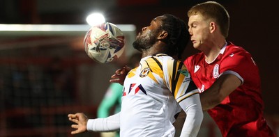 110325 - Accrington Stanley v Newport County - Sky Bet League 2 - Geoffroy Bony of Newport and Devon Matthews of Accrington