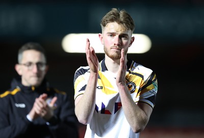 110325 - Accrington Stanley v Newport County - Sky Bet League 2 - Matt Baker of Newport looks upset as he applauds the travelling fans