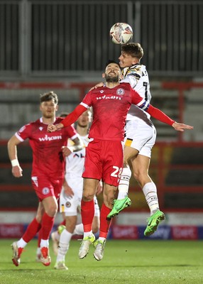 110325 - Accrington Stanley v Newport County - Sky Bet League 2 - Kai Whitmore of Newport and Seamus Conneely of Accrington