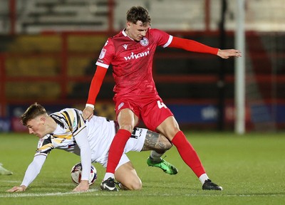 110325 - Accrington Stanley v Newport County - Sky Bet League 2 - Kai Whitmore of Newport and Joe O’Brien-Whitmarsh of Accrington tussle for the ball