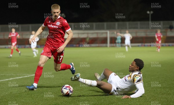 110325 - Accrington Stanley v Newport County - Sky Bet League 2 - Bobby Kamwa of Newport is felled by Devon Matthews of Accrington