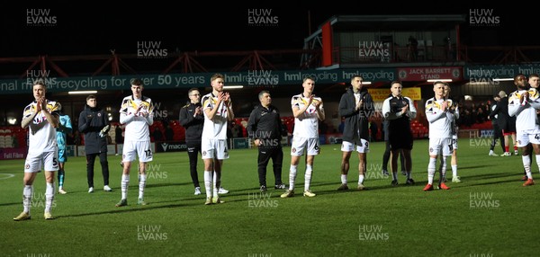 110325 - Accrington Stanley v Newport County - Sky Bet League 2 - Team applaud travelling fans at the end of the match with Newport manager Nelson Jardin