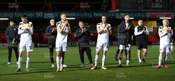 110325 - Accrington Stanley v Newport County - Sky Bet League 2 - Team applaud travelling fans at the end of the match with Newport manager Nelson Jardin