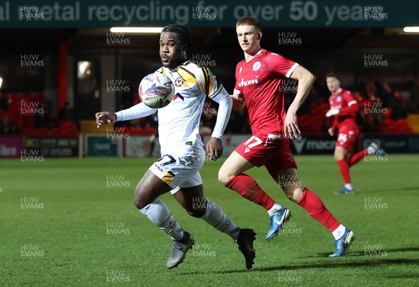 110325 - Accrington Stanley v Newport County - Sky Bet League 2 - Geoffroy Bony of Newport and Devon Matthews of Accrington