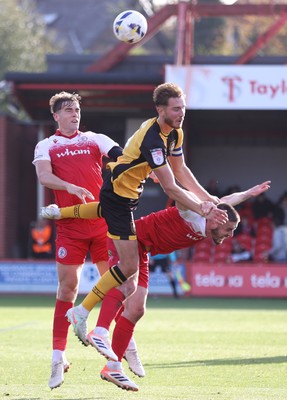 111025 - Accrington Stanley v Newport County - Sky Bet League 2 - Matt Baker of Newport climbs onto the back of Liam Coyle of Accrington with Josh Smith of Accrington