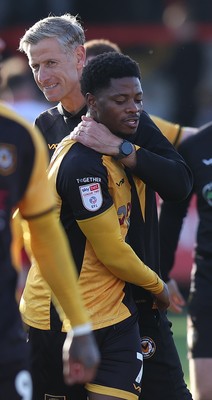 111025 - Accrington Stanley v Newport County - Sky Bet League 2 - Newport manager David Hughes hugs goalscorer Bobby Kamwa of Newport at the end of the match