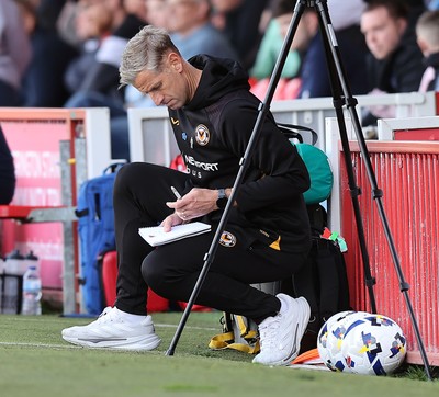 111025 - Accrington Stanley v Newport County - Sky Bet League 2 - Newport manager David Hughes makes notes during match