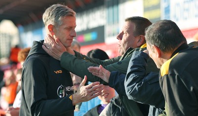 111025 - Accrington Stanley v Newport County - Sky Bet League 2 - Newport manager David Hughes is hugged by fan at the end of the match