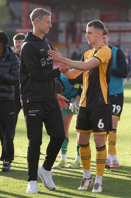 111025 - Accrington Stanley v Newport County - Sky Bet League 2 - Newport manager David Hughes and Ciaran Brennan of Newport at the end of the match