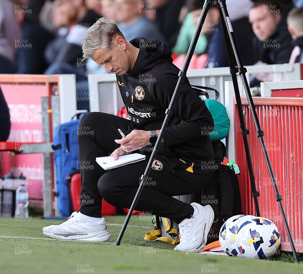 111025 - Accrington Stanley v Newport County - Sky Bet League 2 - Newport manager David Hughes makes notes during match