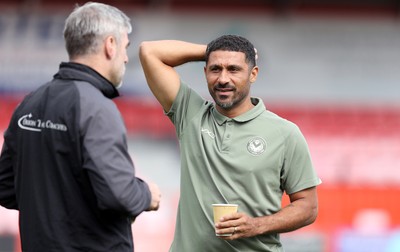 190926 - Accrington Stanley v Newport County - Sky Bet League 2 - Manager Hayden Mullins of Newport talks to Accrington’s goalkeeping coach