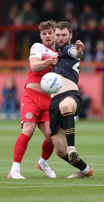190926 - Accrington Stanley v Newport County - Sky Bet League 2 - Kyle Cameron of Newport is held back by Tyler Walton of Accrington