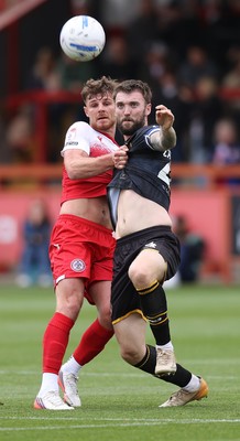 190926 - Accrington Stanley v Newport County - Sky Bet League 2 - Kyle Cameron of Newport is held back by Tyler Walton of Accrington