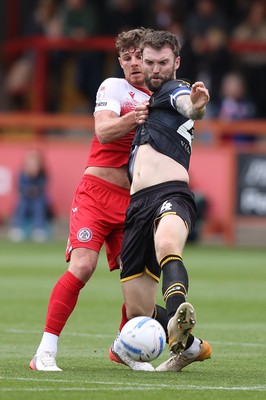 190926 - Accrington Stanley v Newport County - Sky Bet League 2 - Kyle Cameron of Newport is held back by Tyler Walton of Accrington