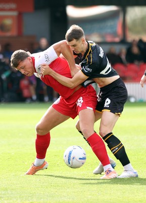 190926 - Accrington Stanley v Newport County - Sky Bet League 2 - Ciaran Brennan of Newport and Charlie Caton of Accrington