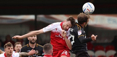 190926 - Accrington Stanley v Newport County - Sky Bet League 2 - Joe Anderson of Accrington and Christian Doidge of Newport head the ball